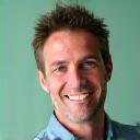 Portrait of Mark Davids, RDN, a confident and approachable man in his 40s, a registered dietitian nutritionist.